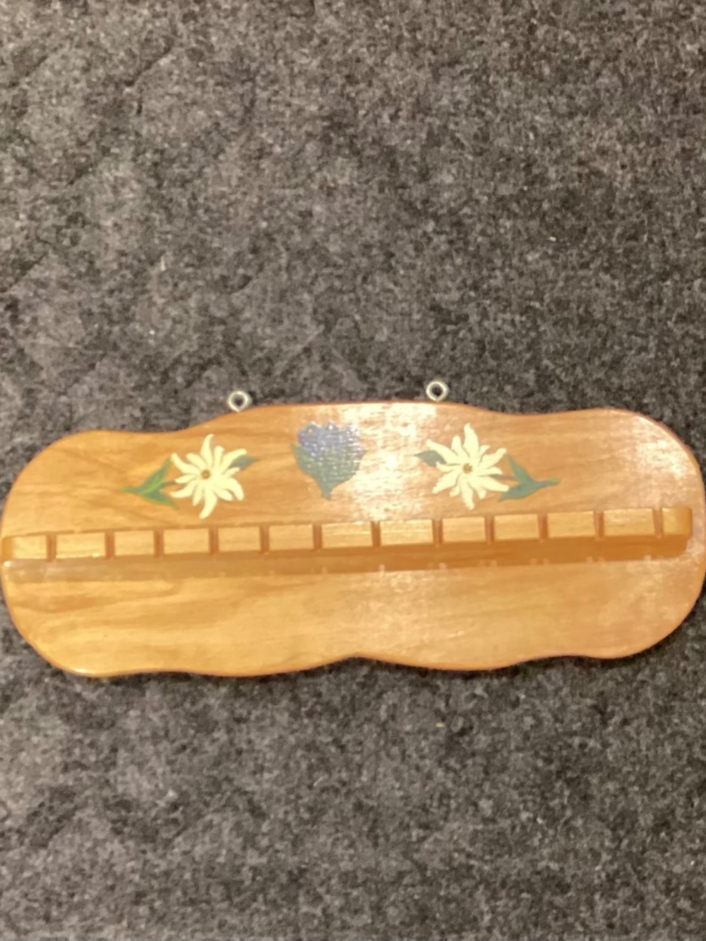 Vintage wooden spoon rack. Holds 12 spoons.
